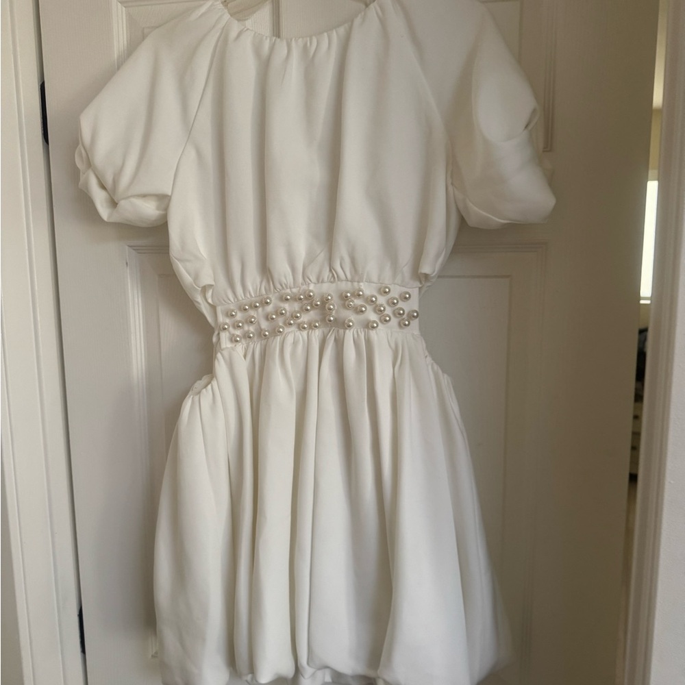 TCEC White Garment with Subtle Details